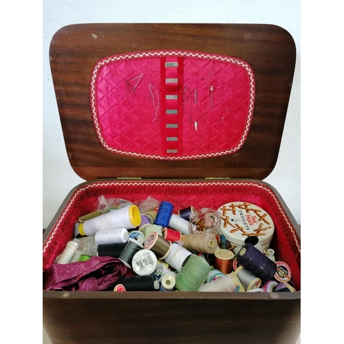 392 - A 1950s sewing box with contents