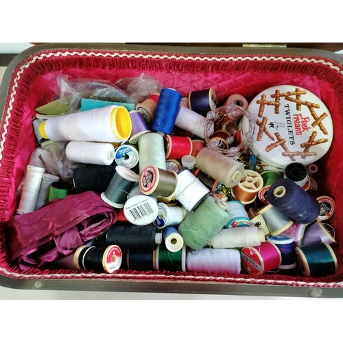 392 - A 1950s sewing box with contents