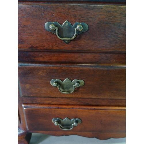 393 - A miniature oak 3 drawer chest with brass handles