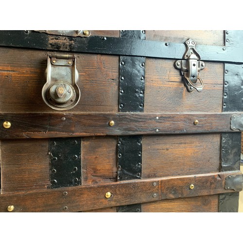 336 - A magnificent antique steamer trunk with wooden and brass banding - refurbished to an exacting stand... 