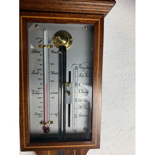 422 - An antique stick barometer