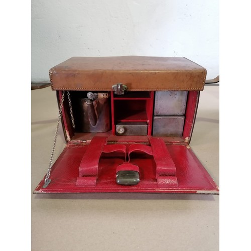 509 - Leather and silver plate picnic set. Beautifully encased for travel. Circa 1920's