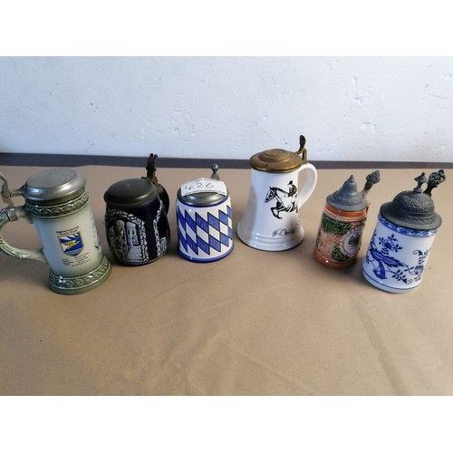 426 - A good collection of German Bier steins