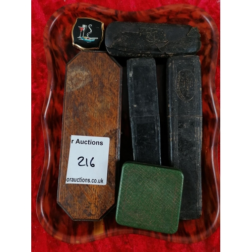 216 - Tray of 3 cuthroat razors, safety razor, pair of paince nez, etc.