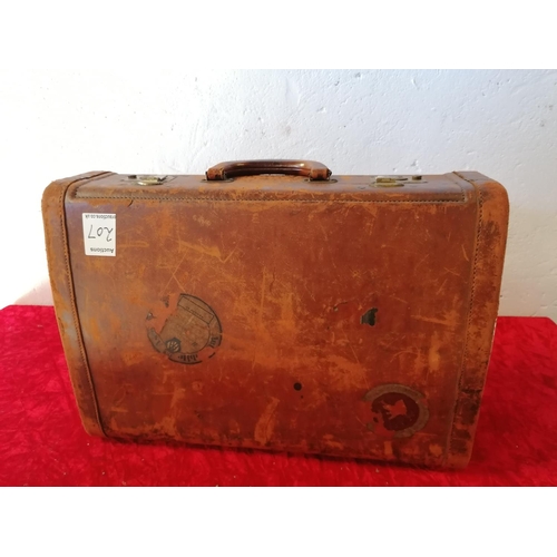 207 - Vintage cow hide leather suitcase by Victor Luggage with a small tan coloured briefcase.