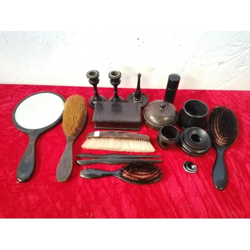 215 - Carton of various ebony and Bakelite brushes, candlesticks, boxes etc.