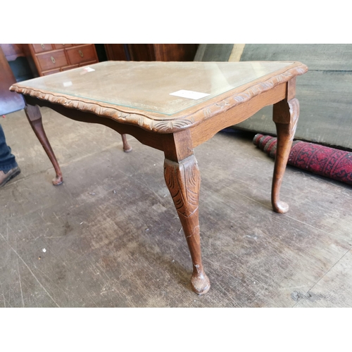 359 - Glass top coffee table.