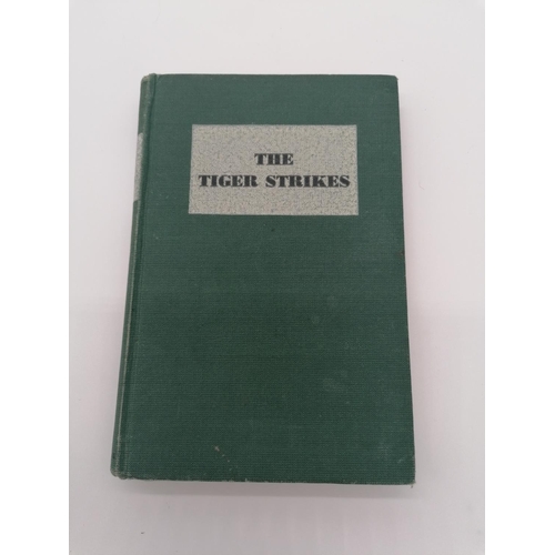 1019 - Hardback, 'The Tiger Strikes' by the Government of India Public Relations. Bound in green cloth with... 