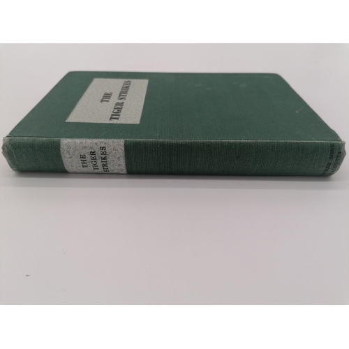 1019 - Hardback, 'The Tiger Strikes' by the Government of India Public Relations. Bound in green cloth with... 