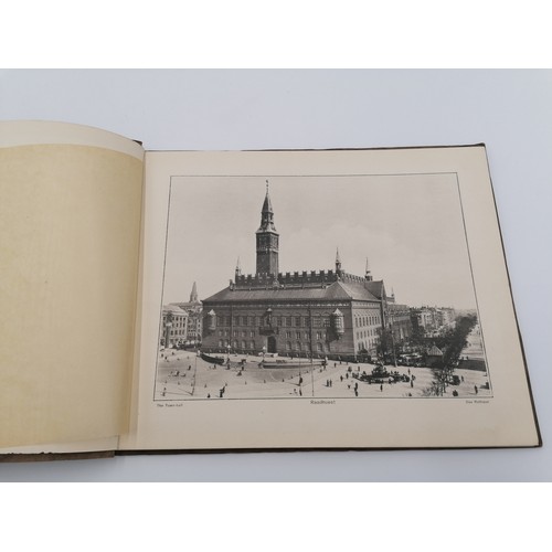 1025 - Brown folder with black lettering and design on front. Contains 47 images of Copenhagen. Published b... 