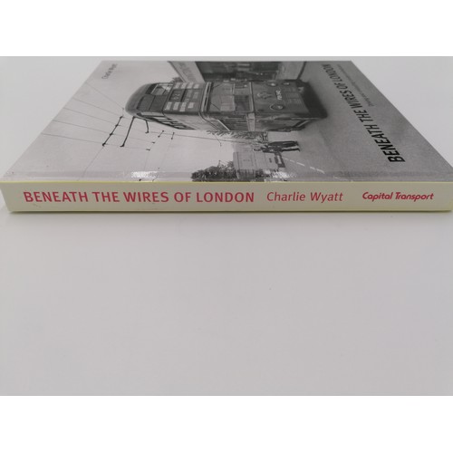 1037 - Hardback, 'Beneath the Wires of London' by Charlie Wyatt. Bound in glassine deco boards with black l... 