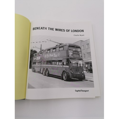 1037 - Hardback, 'Beneath the Wires of London' by Charlie Wyatt. Bound in glassine deco boards with black l... 