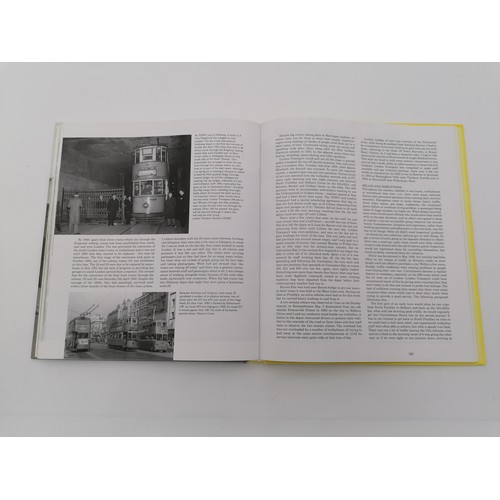 1037 - Hardback, 'Beneath the Wires of London' by Charlie Wyatt. Bound in glassine deco boards with black l... 