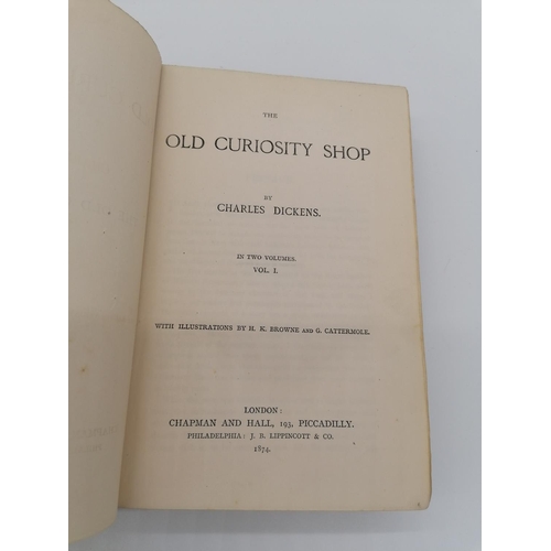 1049 - 2 Hardbacks, 'The Old Curiosity Shop' by Charles Dickens. Bound in green cloth with 2 black deco bou... 