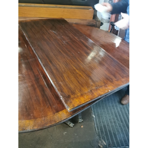 341 - Repro D.End table with leaf and clamps. Brass claw end feet with casters.