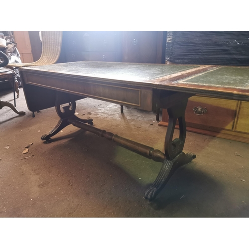 371 - Drop leaf coffee table with green leather insert