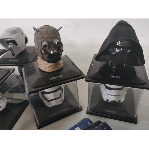 4 - Collection of 16 Star Wars figure heads with accompanying magazines.