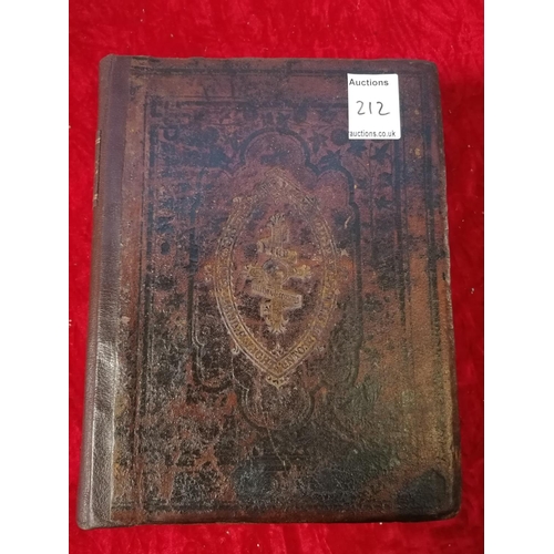 212 - Large leather bound family Bible by Reverend John Brown (good condition with coloured illustrations)... 