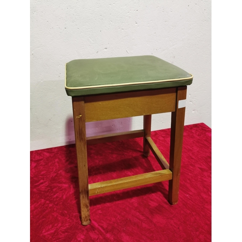 64 - Green topped stool. 21 inches tall.