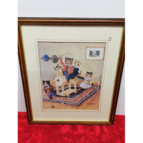 440 - Louis Wain print of anthropomorphized kittens. 15x13 inches.