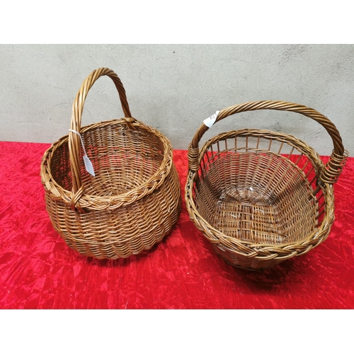 214 - 2 wicker baskets.