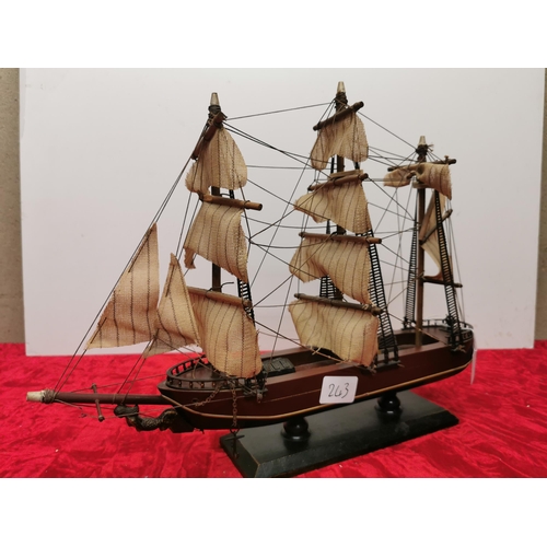 243 - Small sailing boat model (40cm by 35cm).