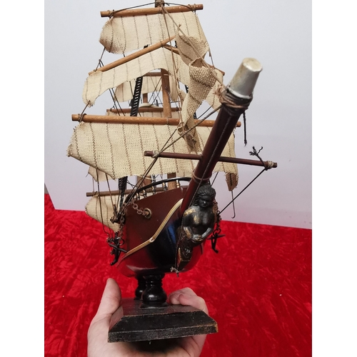 243 - Small sailing boat model (40cm by 35cm).