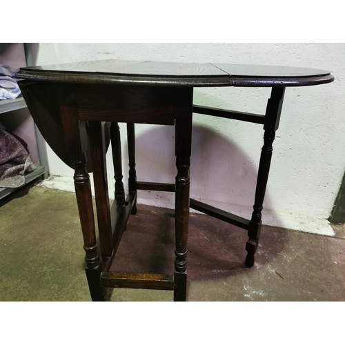 140 - Solid gate leg occasional table. (28