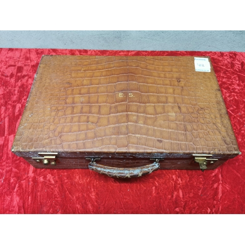 412 - Snakeskin briefcase marked E.S. from Asprey in London.