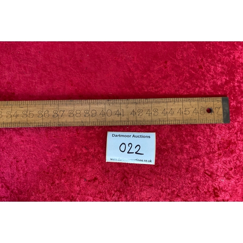 22 - 48 inch wooden ruler with metal ends. Good condition.