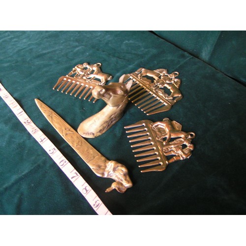 277 - Lovely collection of brass combs, envelope opener and horse head.