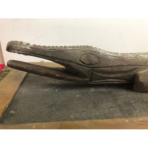 209 - Old carved wooden mounted crocodile, frame a/f, Base measures approx. 87 x 26cm