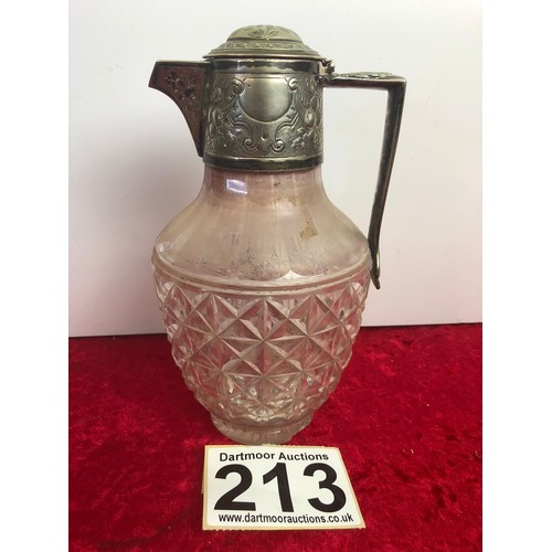 213 - Antique glass claret jug with silver plated lid