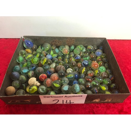 214 - Tin box of old marbles