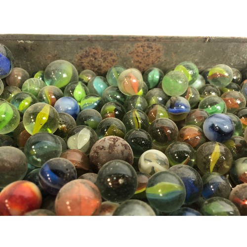 214 - Tin box of old marbles