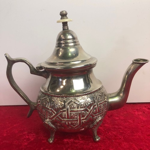 215 - Oriental white metal teapot with Islamic mark to base