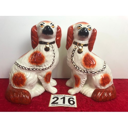 216 - Pair of antique china Springer Spaniels