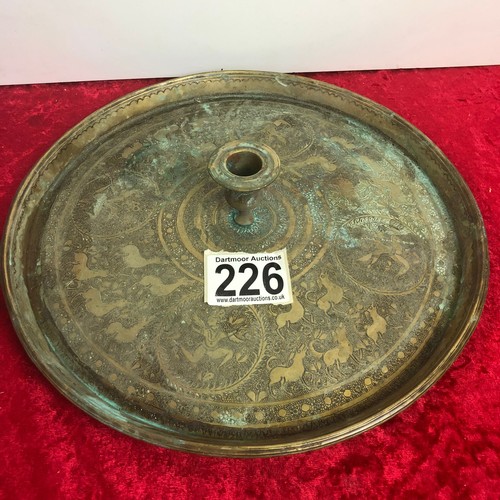 226 - Unusual Indian engraved brass candle tray, approx. 32cm dia