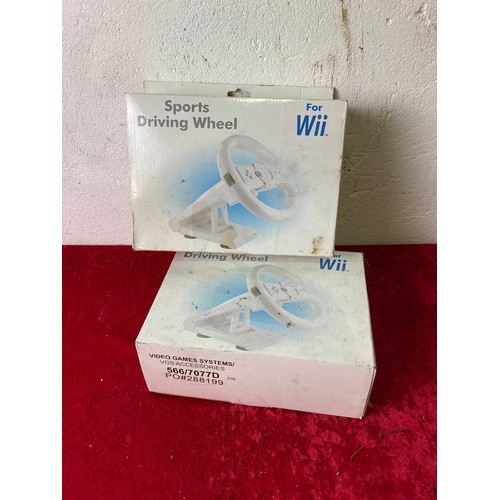 400 - Two large boxes of steering wheels for the Nintendo WII