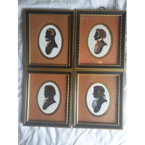 562 - Set of 4 gilt tinted portrait silhouettes of the great composers, signed in pencil 13 x 41 each.