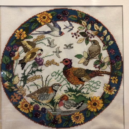 232 - Framed and glazed embroidery picture of garden bird including pheasant, partridge, swallow and goldf... 