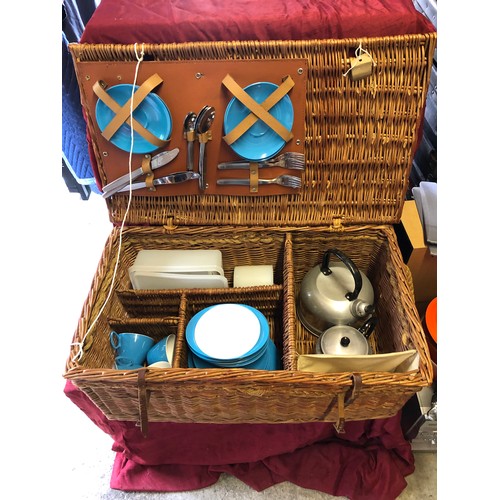 239 - Large wicker picnic basket with metal kettle and teapot + vintage Gaydon Melmex cups, plates and bow... 