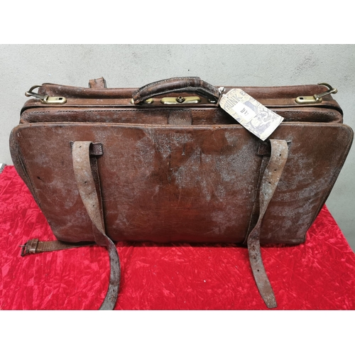 59 - A truly majestic piece of vintage luggage, Leather and cloth carrying case with brass fittings and k... 