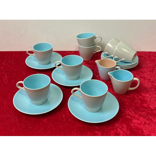 102 - Poole pottery tea set with eight cups and saucers along with a nice pair of jugs, pale blue design