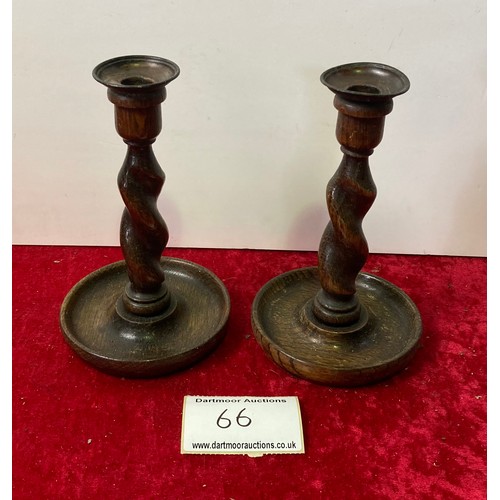 66 - 2 barley twist wood candle sticks, approx 21cm tall