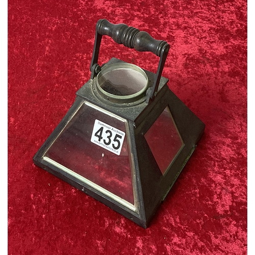 435 - A lantern with metal handle