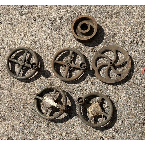 29 - Circular valve wheels (one marked B25900 wheel Ford Motor Company) and others