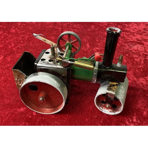 43 - Mamod Steam Engines. A live steam traction engine and steam roller. Light the fire and boil for six ... 