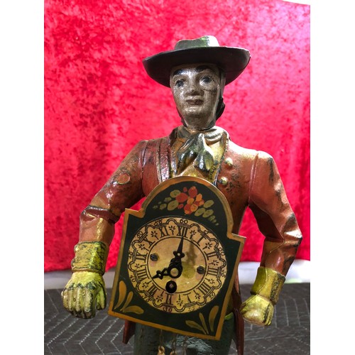 250 - Metal figure of Man with clock on front (needs attention)