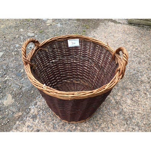 34 - Large wicker log basket in very good condition